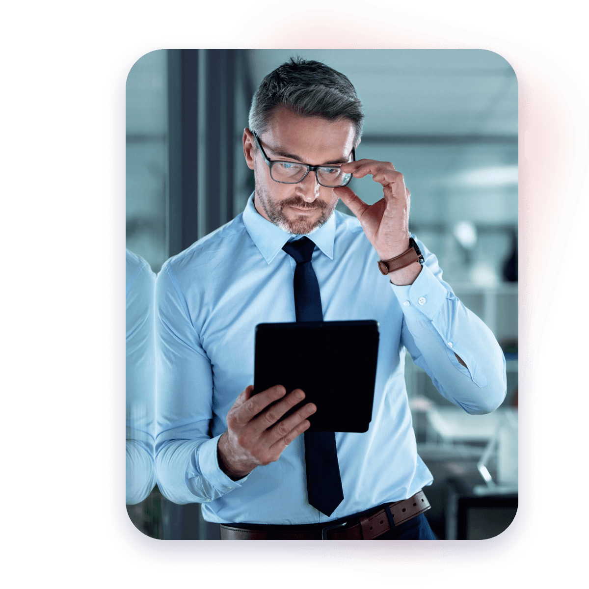 man looking at tablet